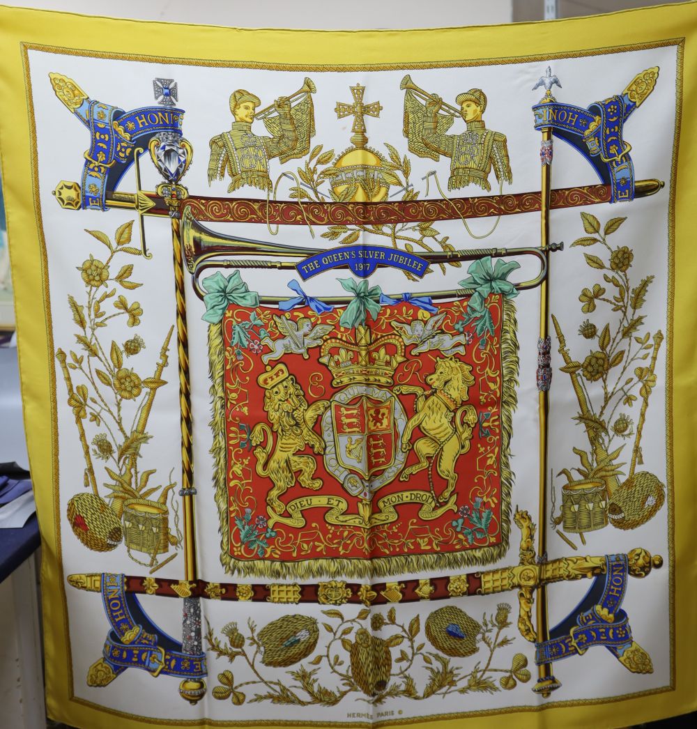 A Hermes The Queens Silver Jubilee 1977 silk scarf together with another signed by C De Savigny